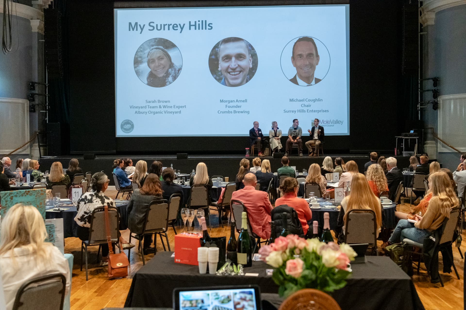 A My Surrey Hills panel of local founders on stage in front of members